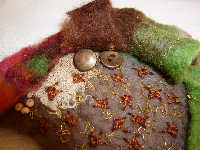 Sorbello stitch and embellishments on manipulated felt